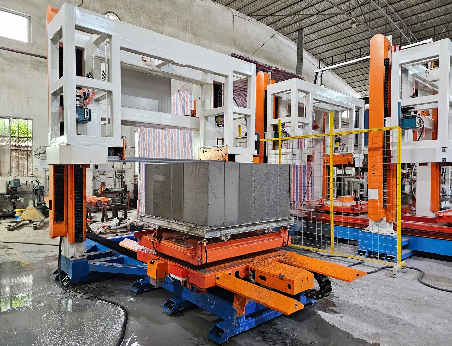 Documented lightweight block cutting demonstration on production equipment