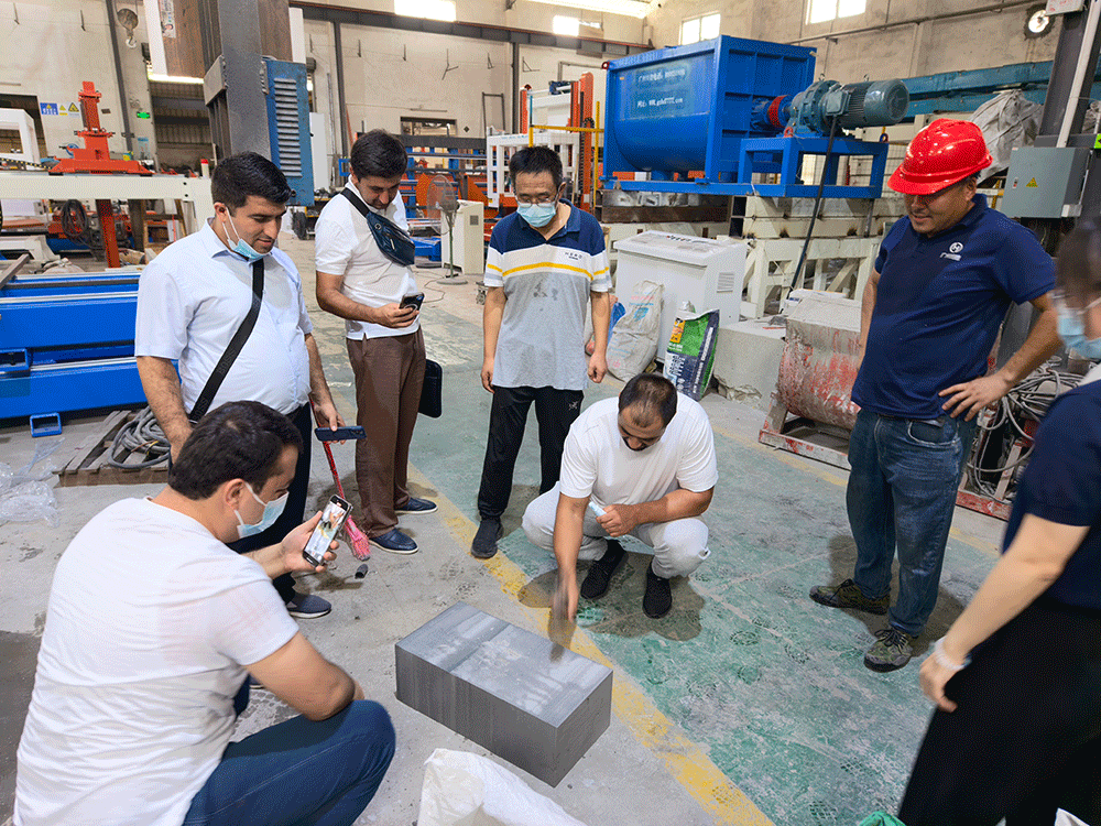 Tajikistan project team reviewing HENGDE lightweight block production equipment