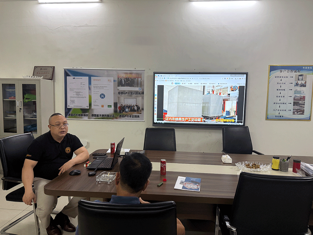 Indonesia project team reviewing HENGDE lightweight block production equipment — factory visit image 1
