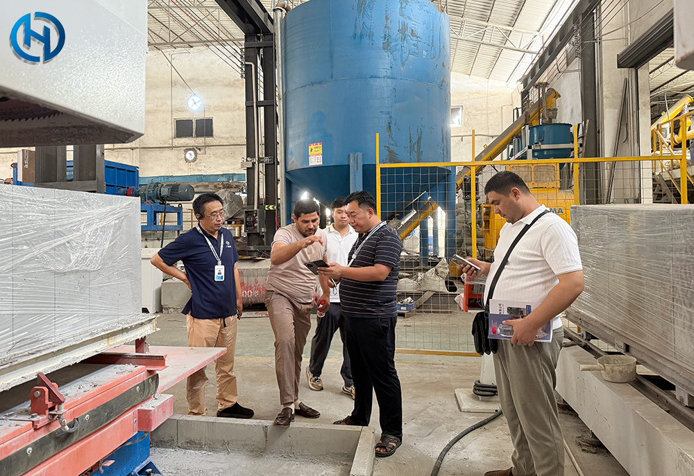 Uzbekistan project team reviewing HENGDE lightweight block production equipment