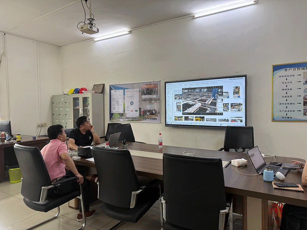China project team reviewing HENGDE ceramsite wall panel production equipment