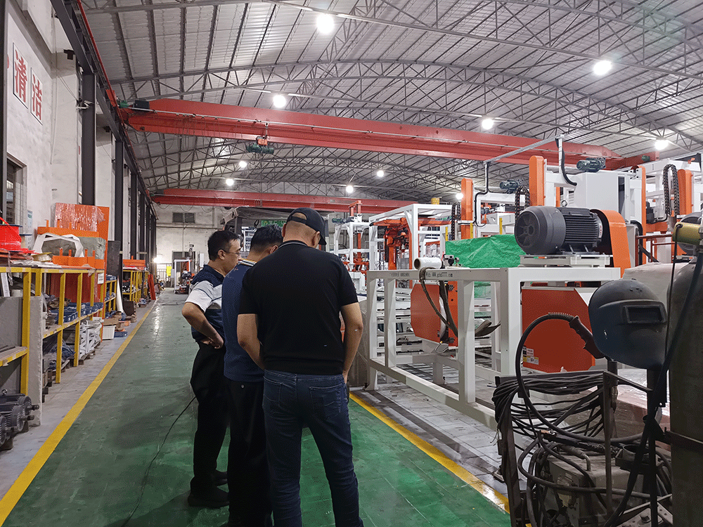Kazakhstan project team reviewing HENGDE lightweight wall panel production equipment