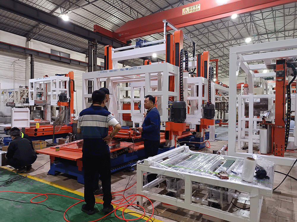 Kazakhstan project team reviewing HENGDE lightweight wall panel production equipment — factory visit image 2
