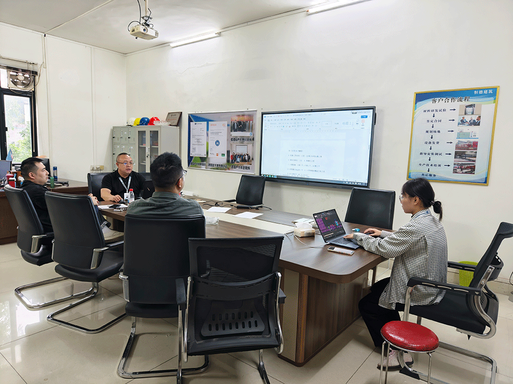 Uzbekistan project team reviewing HENGDE clc / foamed concrete block production equipment — factory visit image 1