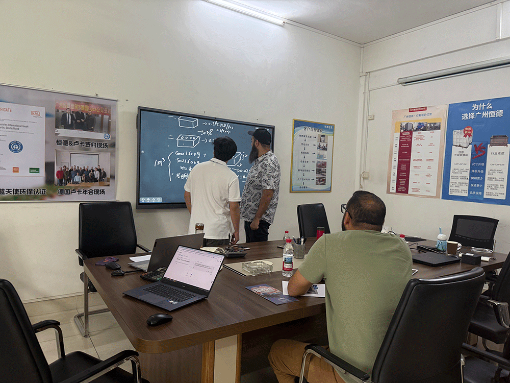 HENGDE project team reviewing HENGDE eps lightweight block production equipment — factory visit image 1