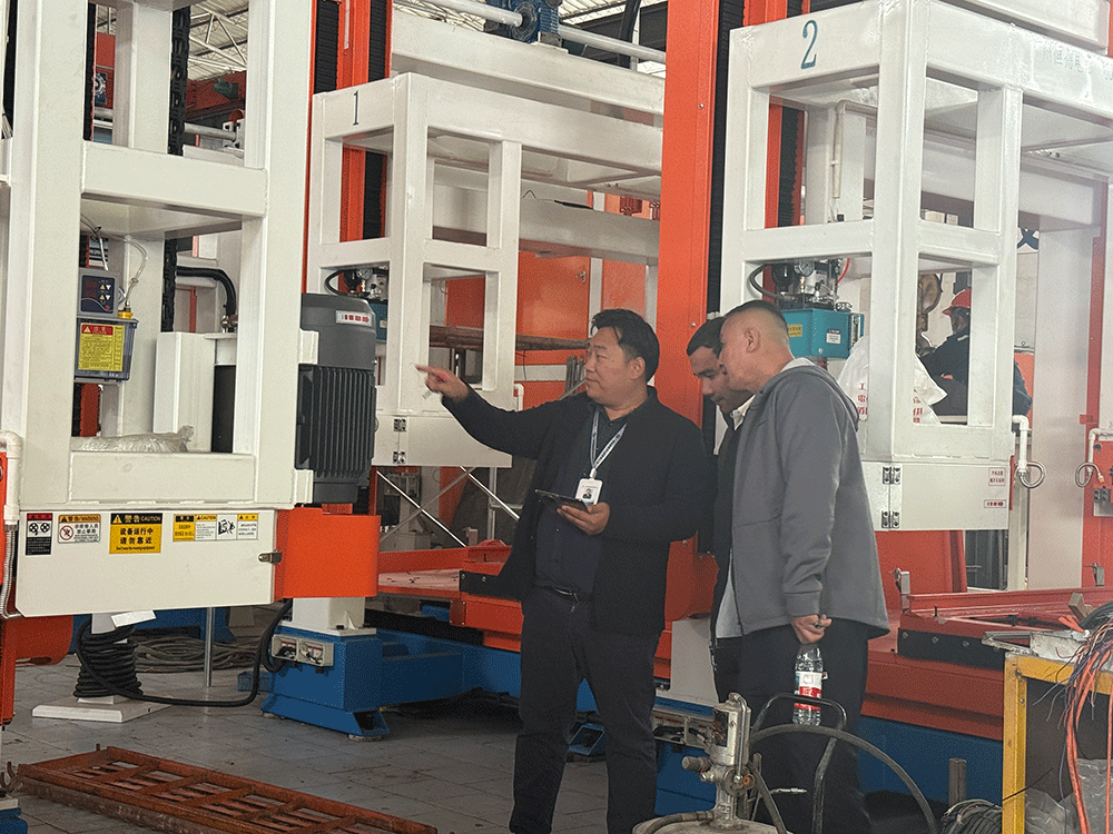 Uzbekistan project team reviewing HENGDE clc / foamed concrete block production equipment — factory visit image 2