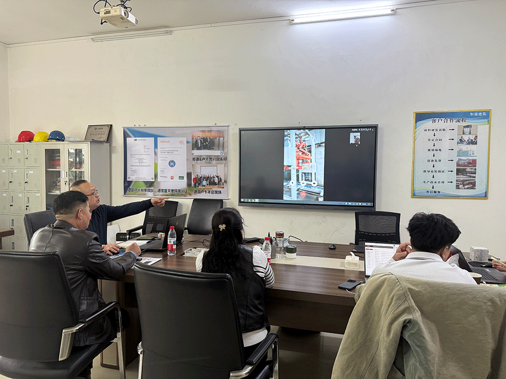 Kenya project team reviewing HENGDE clc / foamed concrete block production equipment — factory visit image 1