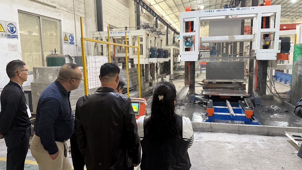 Kenya project team reviewing HENGDE clc / foamed concrete block production equipment — factory visit image 2