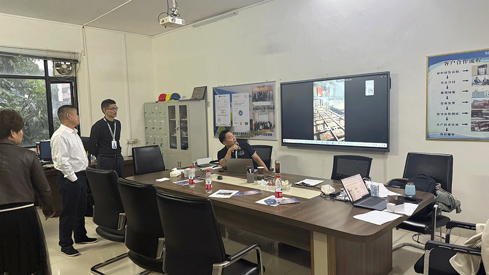 China project team reviewing HENGDE ceramsite lightweight block production equipment — factory visit image 2
