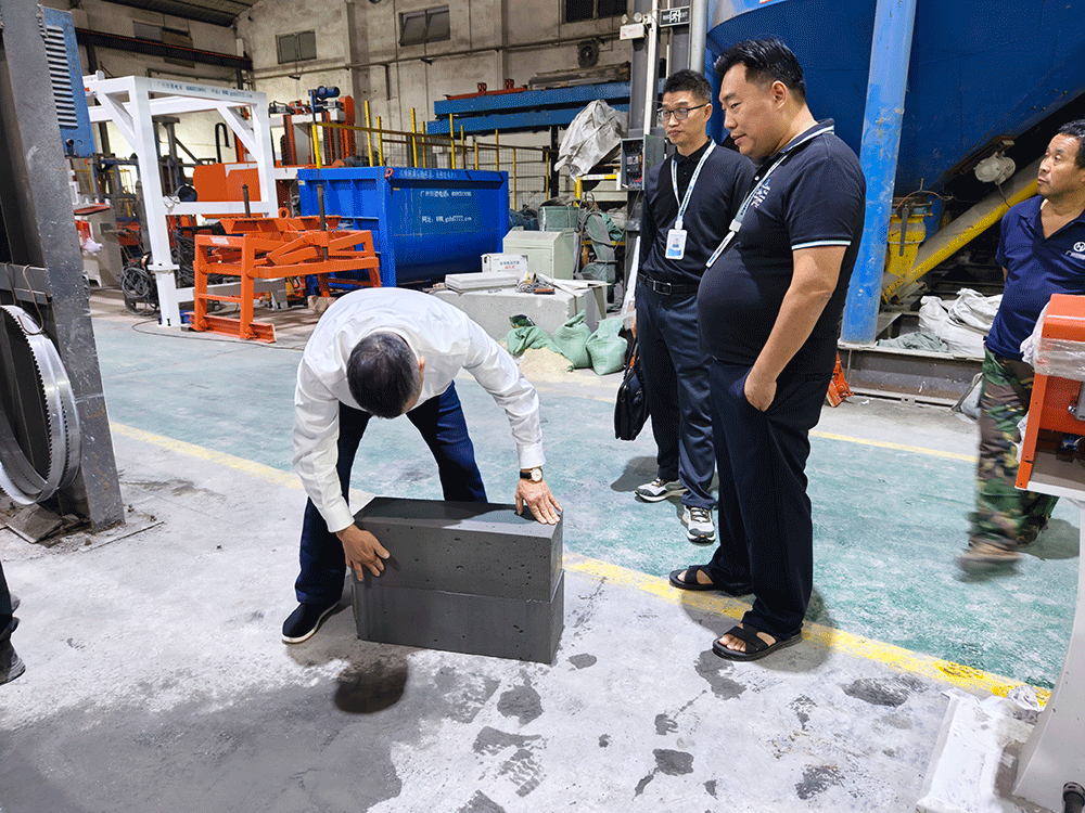 China project team reviewing HENGDE ceramsite lightweight block production equipment — factory visit image 3