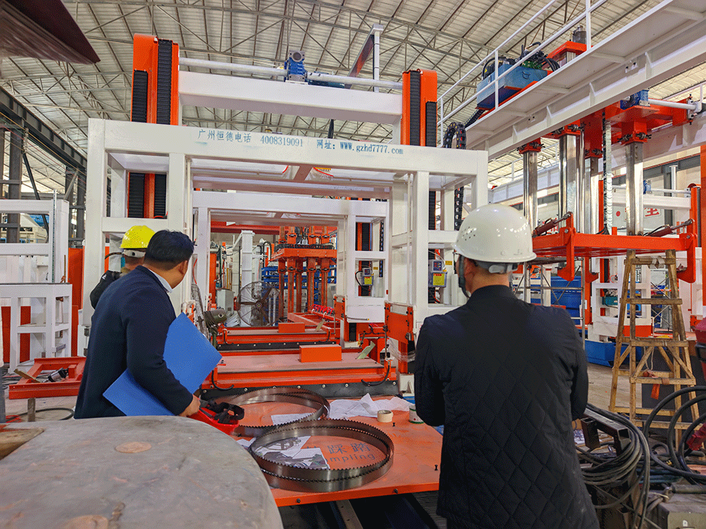 DR Congo project team reviewing HENGDE lightweight block production equipment — factory visit image 2