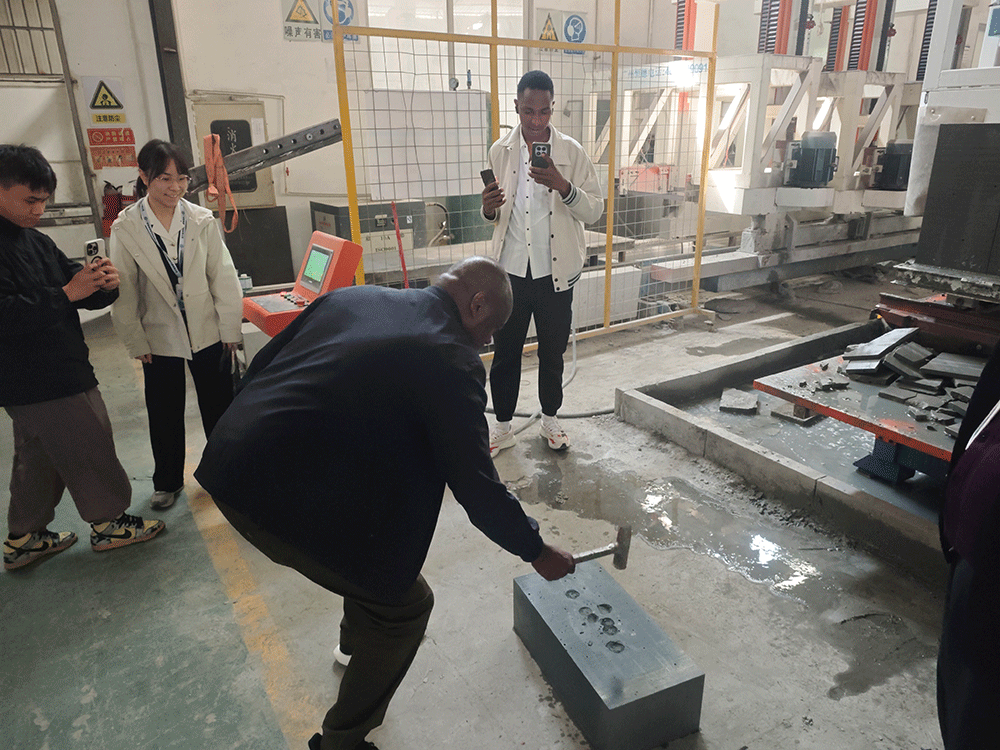 HENGDE project team reviewing HENGDE lightweight block production equipment — factory visit image 1