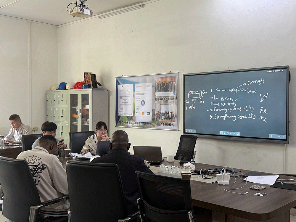 HENGDE project team reviewing HENGDE lightweight block production equipment — factory visit image 2