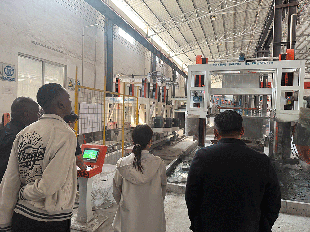 HENGDE project team reviewing HENGDE lightweight block production equipment — factory visit image 3