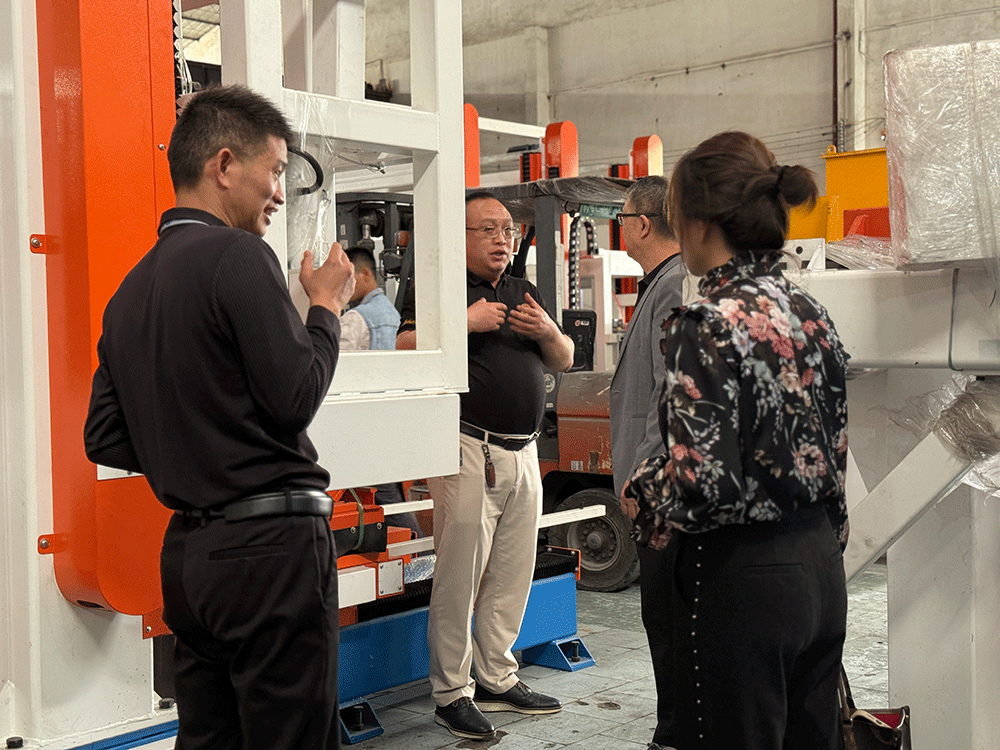 Timor-Leste project team reviewing HENGDE clc / foamed concrete block production equipment — factory visit image 1