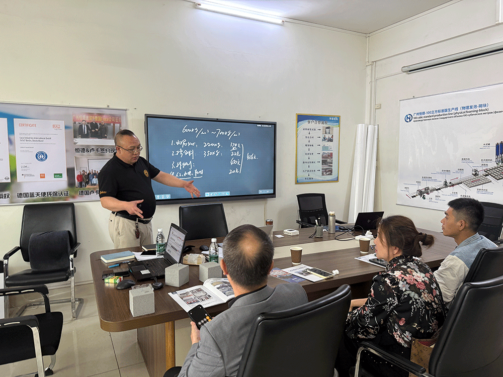 Timor-Leste project team reviewing HENGDE clc / foamed concrete block production equipment — factory visit image 2