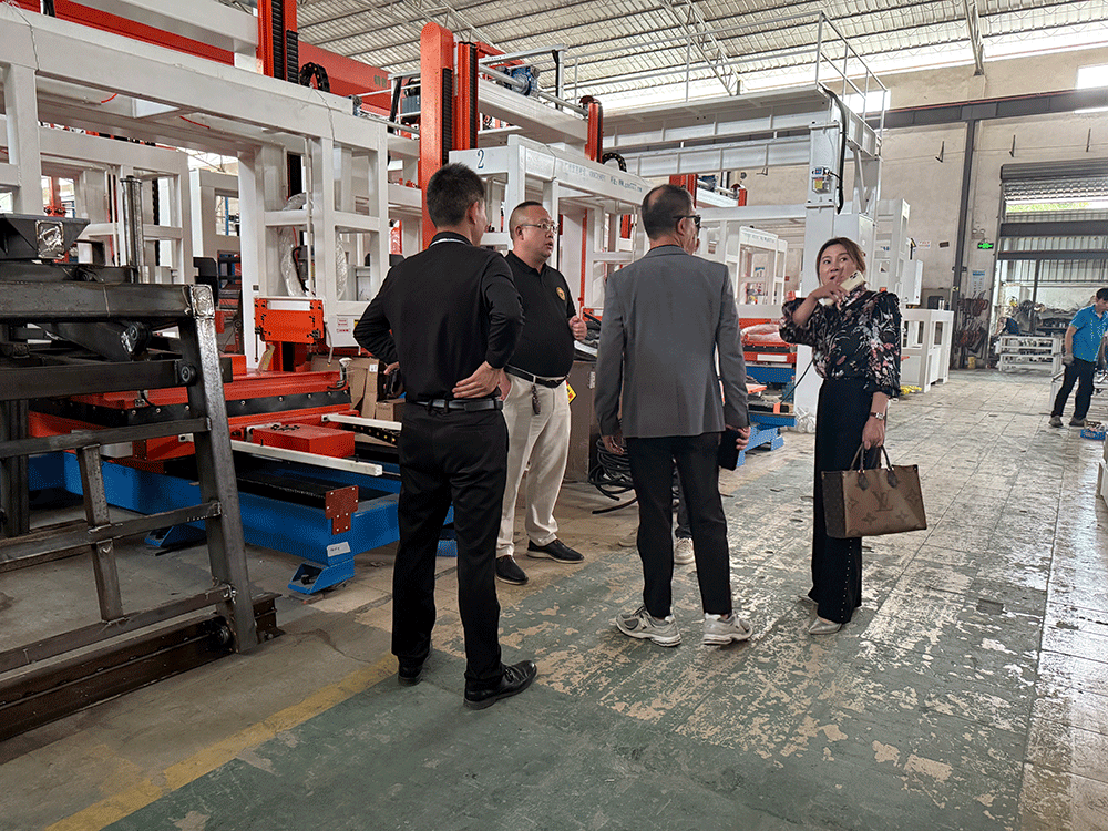 Timor-Leste project team reviewing HENGDE clc / foamed concrete block production equipment — factory visit image 3