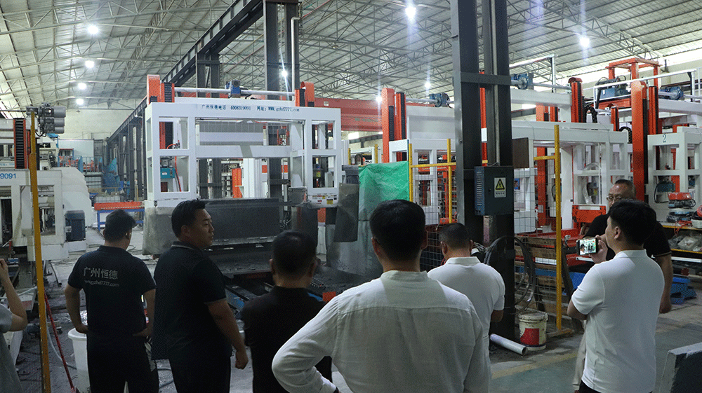 Indonesia project team reviewing HENGDE lightweight block production equipment