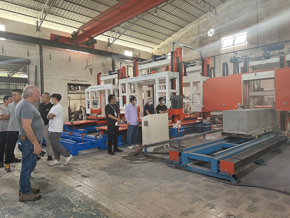 HENGDE project team reviewing HENGDE cutting system production equipment — factory visit image 3