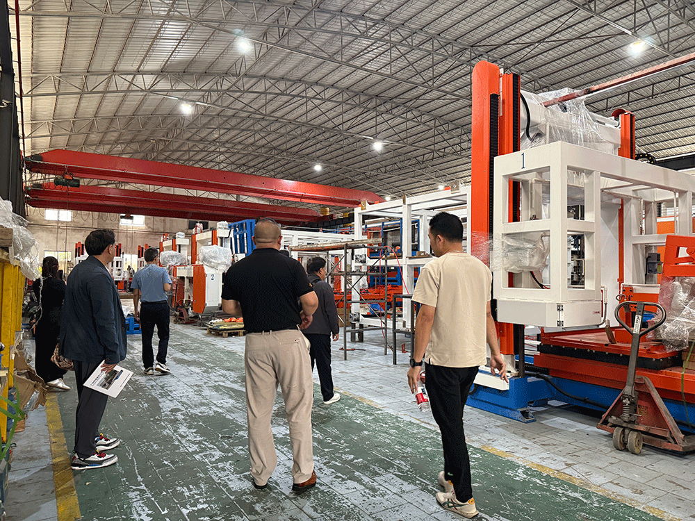 Philippines project team reviewing HENGDE lightweight wall panel production equipment
