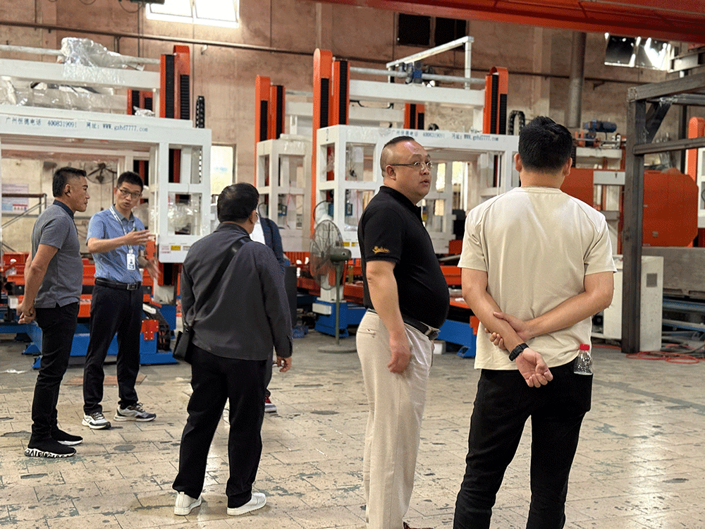 Philippines project team reviewing HENGDE lightweight wall panel production equipment — factory visit image 1