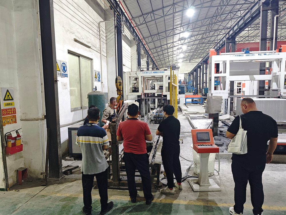 Albania project team reviewing HENGDE cutting system production equipment — factory visit image 3