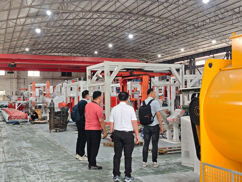 Malaysia project team reviewing HENGDE lightweight block production equipment
