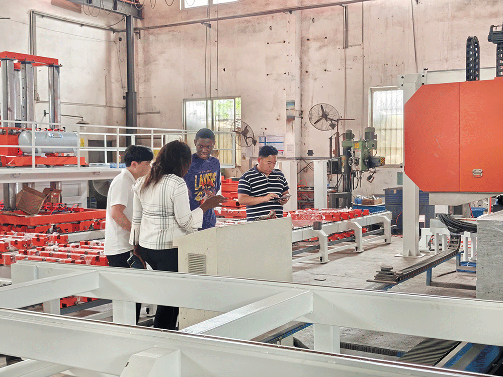South Africa project team reviewing HENGDE lightweight wall panel production equipment