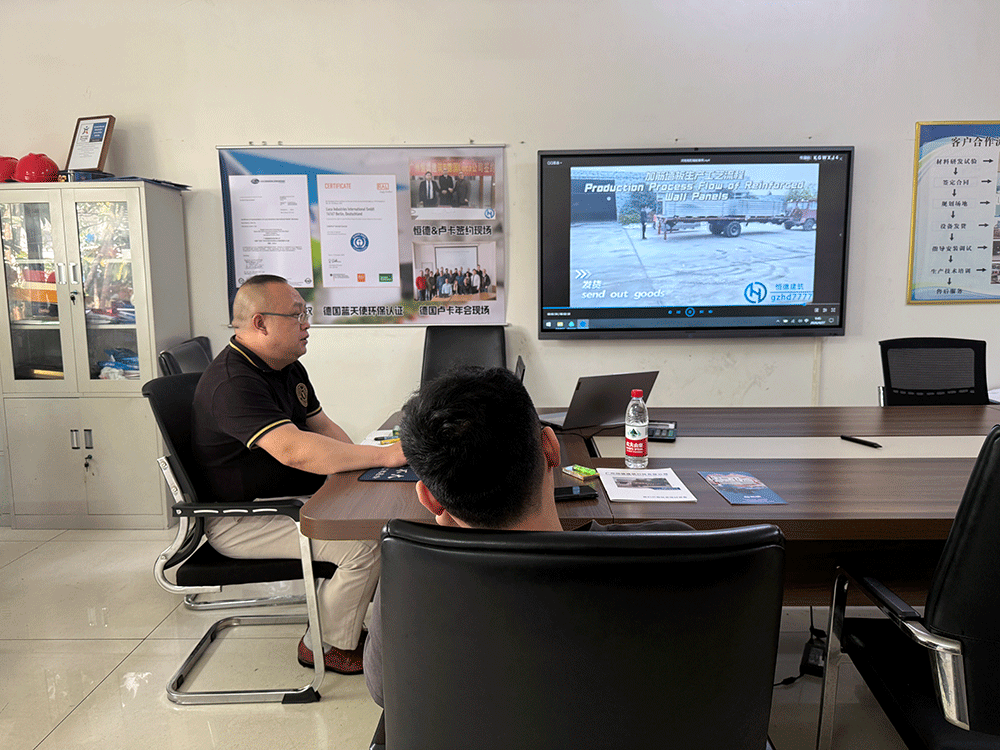 Guyana project team reviewing HENGDE lightweight block production equipment — factory visit image 3