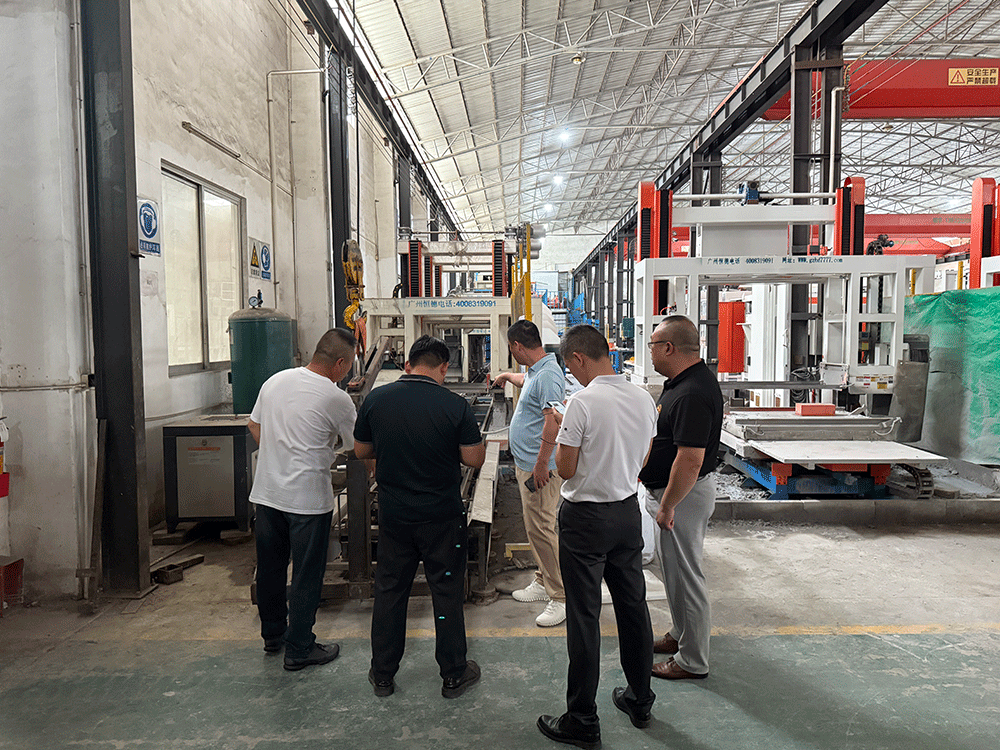 Mongolia project team reviewing HENGDE self-insulating block production equipment