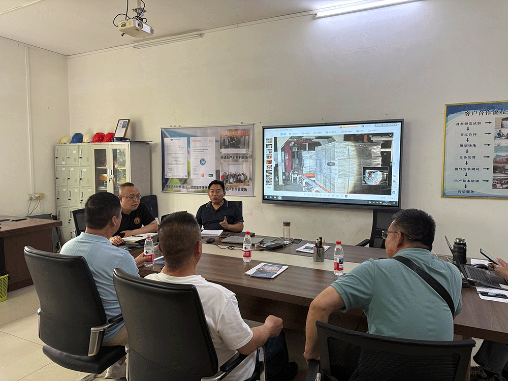 Mongolia project team reviewing HENGDE self-insulating block production equipment — factory visit image 2