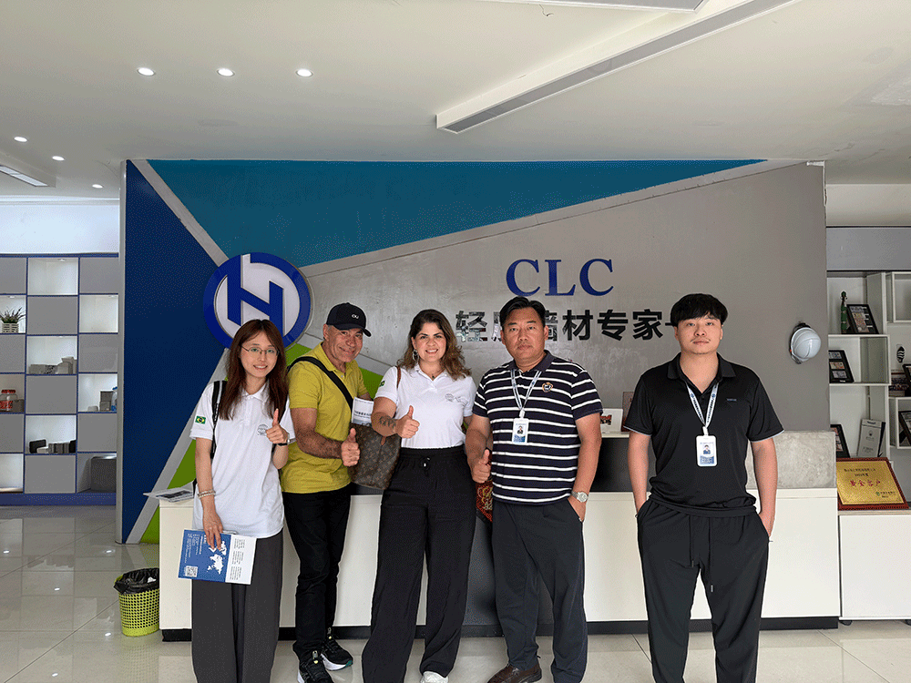 Brazil project team reviewing HENGDE lightweight wall panel production equipment