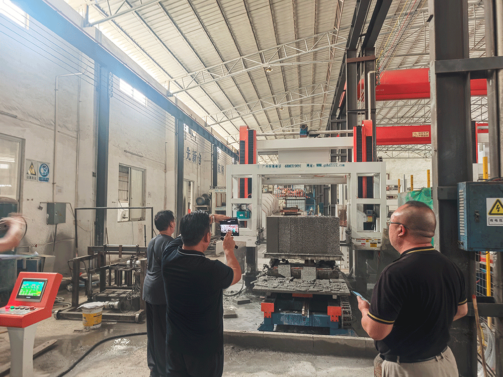 China project team reviewing HENGDE self-insulating block production equipment
