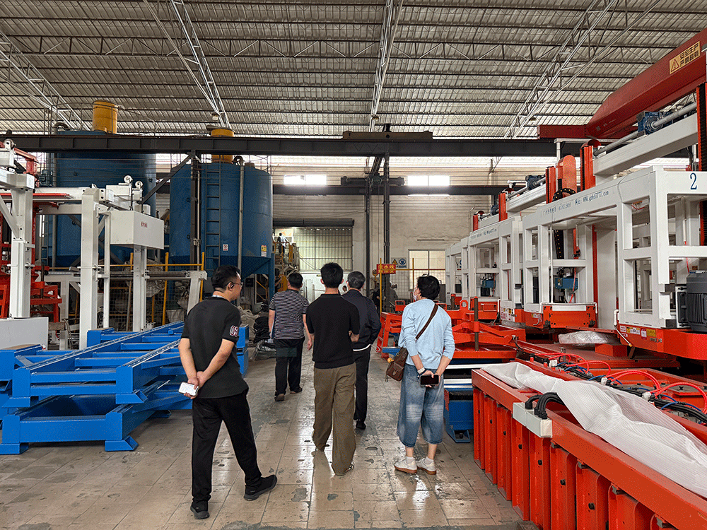 Malaysia project team reviewing HENGDE lightweight wall panel production equipment