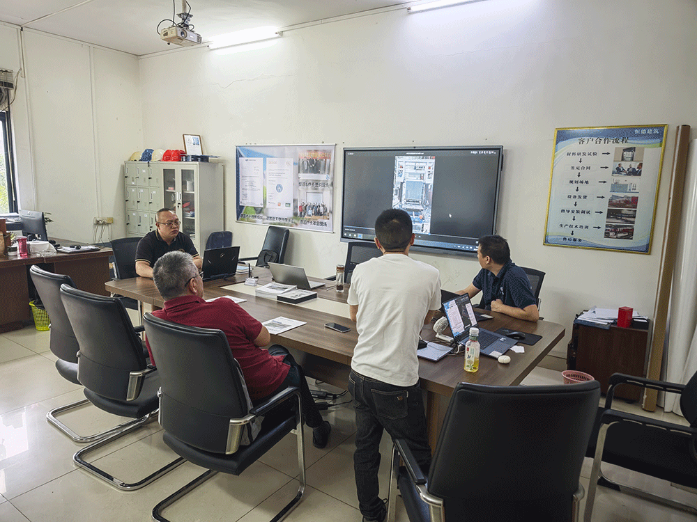 China project team reviewing HENGDE ceramsite lightweight block production equipment — factory visit image 2
