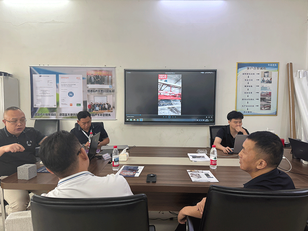 Malaysia project team reviewing HENGDE lightweight block production equipment