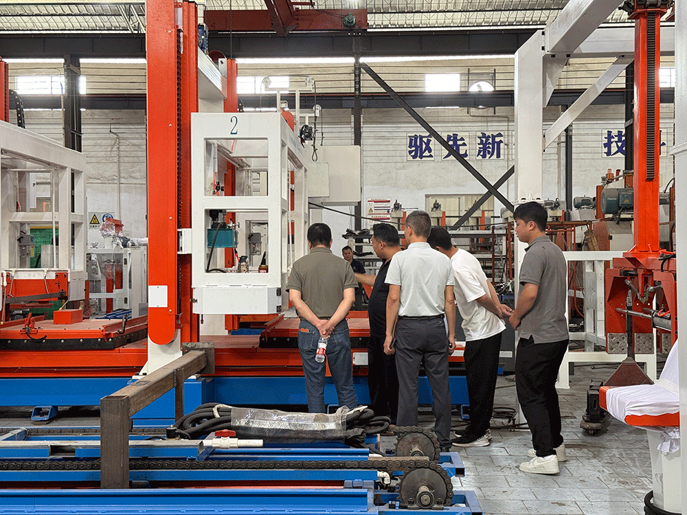 China project team reviewing HENGDE fire-door core panel production equipment — factory visit image 1