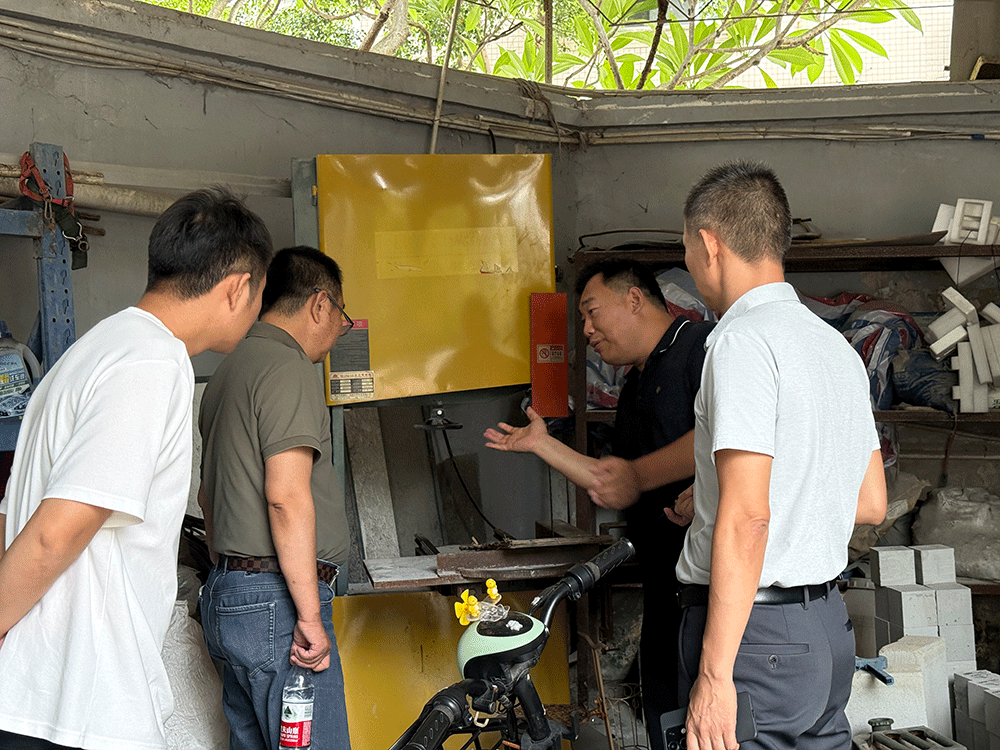 China project team reviewing HENGDE fire-door core panel production equipment — factory visit image 3