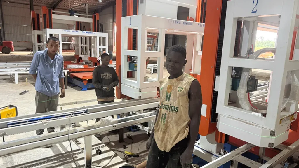 Hengde engineer and project personnel working beside equipment at a Côte d’Ivoire installation site